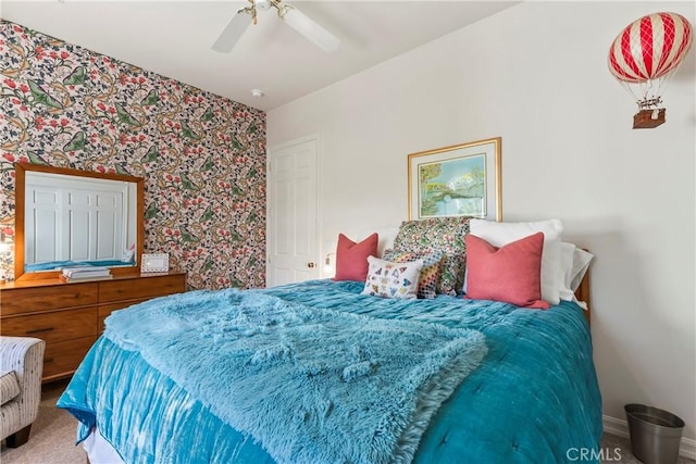 bedroom featuring carpet and ceiling fan