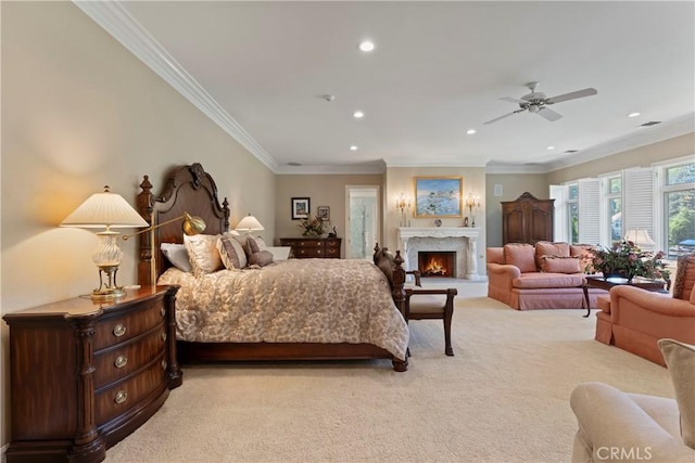 carpeted bedroom with ceiling fan and crown molding