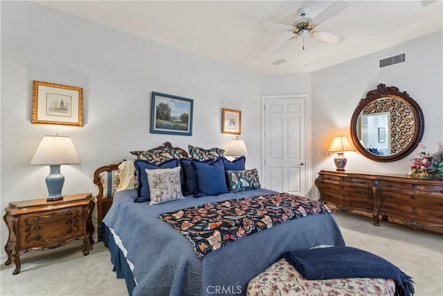 carpeted bedroom featuring ceiling fan