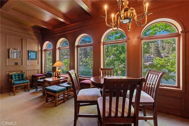 interior space featuring beam ceiling, an inviting chandelier, and wooden ceiling