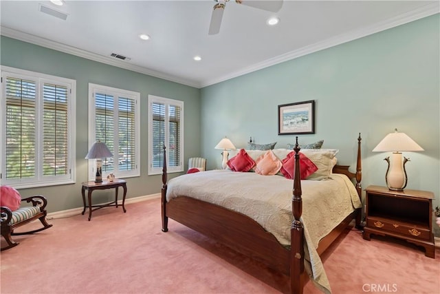 carpeted bedroom featuring ceiling fan and ornamental molding