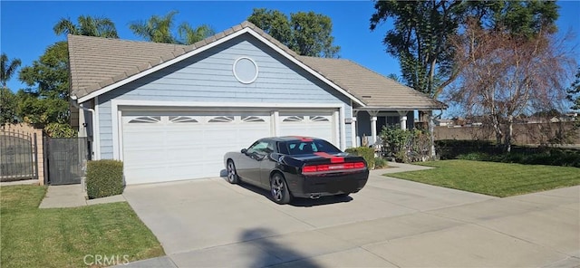 ranch-style house featuring a front lawn and a garage