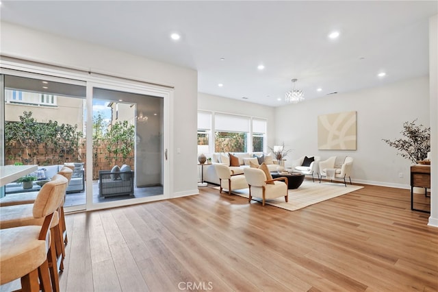 living room with light hardwood / wood-style flooring