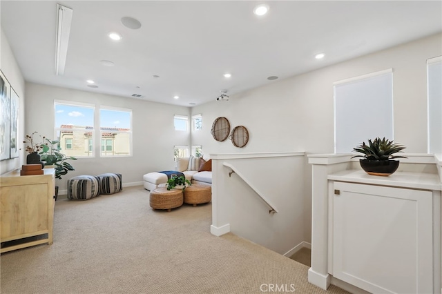 interior space with light colored carpet