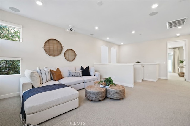 living room featuring light colored carpet