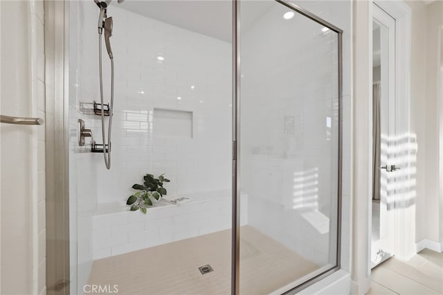 bathroom featuring an enclosed shower