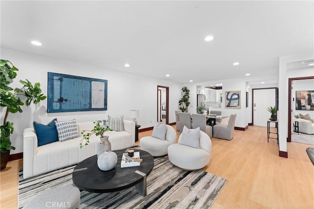 living room featuring light wood-type flooring