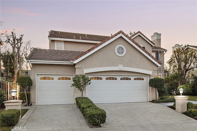 view of front property with a garage