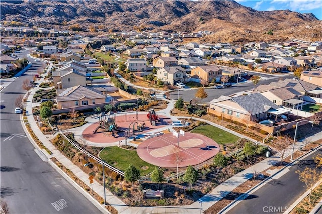 drone / aerial view featuring a mountain view