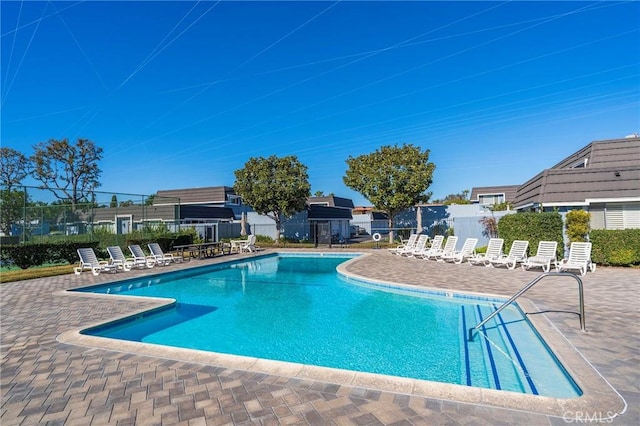 view of swimming pool featuring a patio