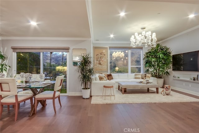 sunroom / solarium with a notable chandelier