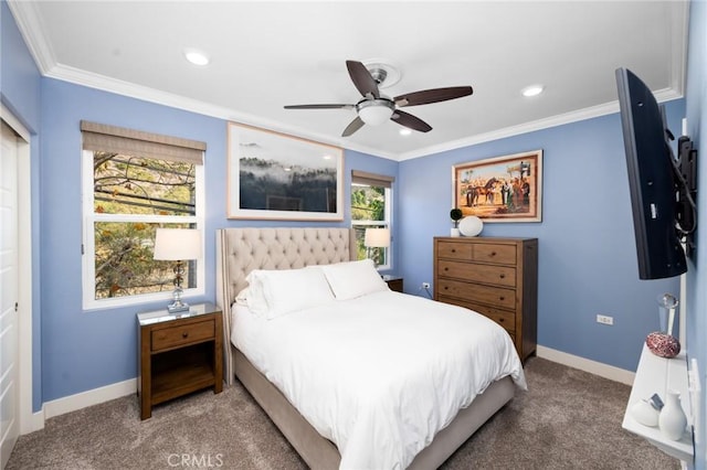 bedroom with ceiling fan, carpet, and crown molding