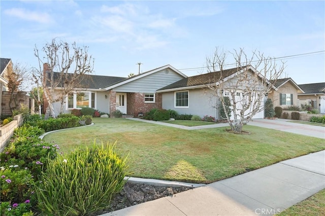 ranch-style home featuring a front yard and a garage