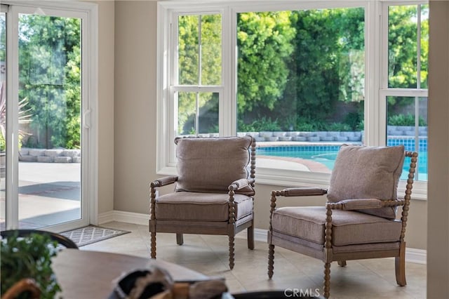 sitting room with light tile patterned flooring