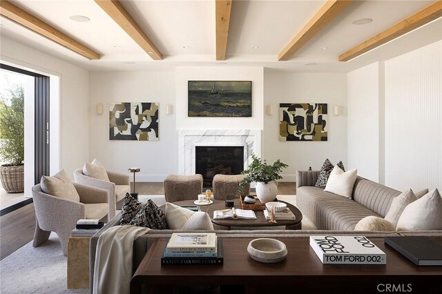 702 Saint James Pl, Newport Beach, CA 92663 - living area with beamed ceiling, a premium fireplace, wood finished floors, and recessed lighting