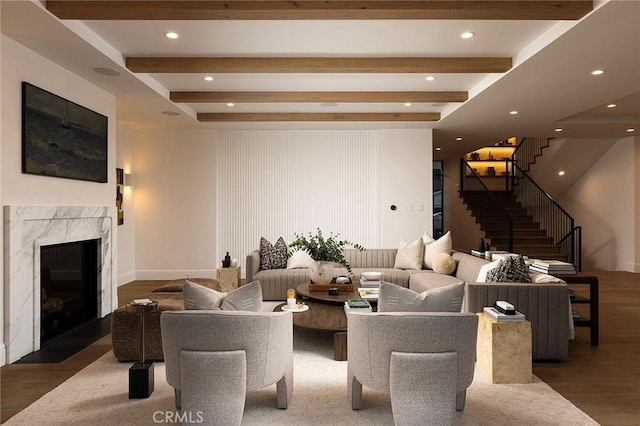702 Saint James Pl, Newport Beach, CA 92663 - living room with stairs, beam ceiling, wood finished floors, recessed lighting, and a premium fireplace