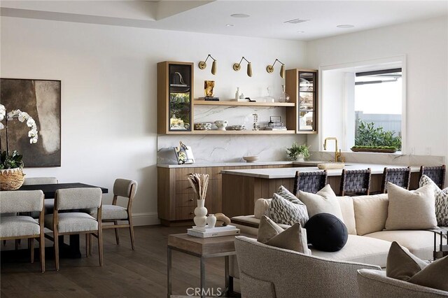 702 Saint James Pl, Newport Beach, CA 92663 - bar featuring dark wood-type flooring and baseboards