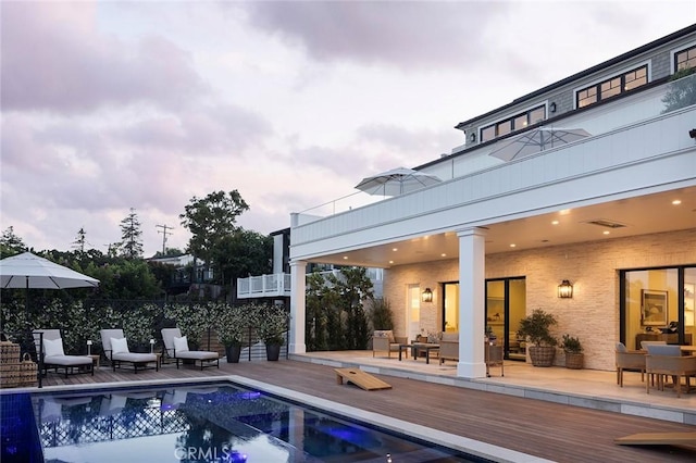 702 Saint James Pl, Newport Beach, CA 92663 - view of swimming pool with a hot tub, an outdoor hangout area, a deck, and a patio area