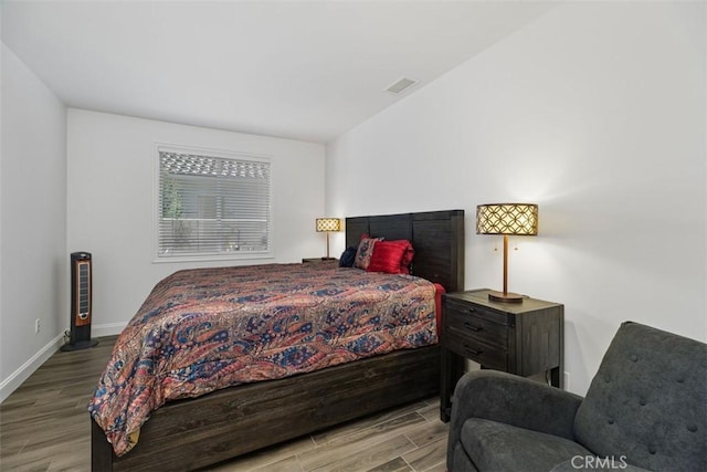 bedroom featuring light hardwood / wood-style floors