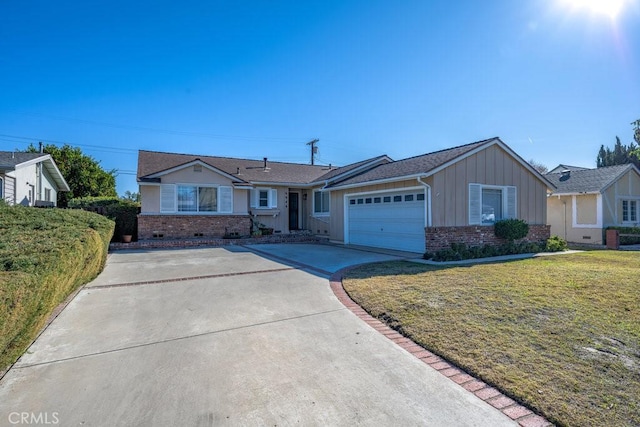 single story home with a front yard and a garage