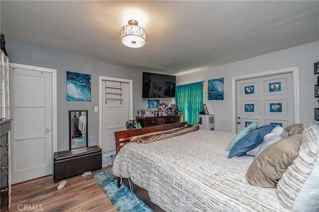 bedroom featuring hardwood / wood-style flooring