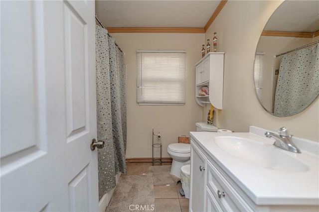 bathroom featuring crown molding, tile patterned floors, vanity, and toilet