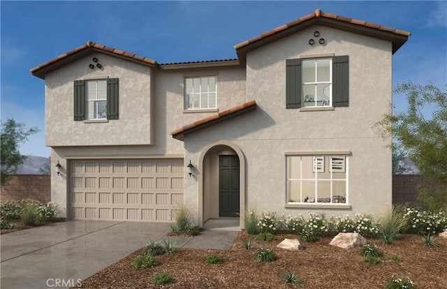 mediterranean / spanish-style home featuring a garage