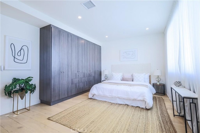 bedroom featuring light hardwood / wood-style flooring