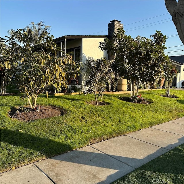 exterior space with a front yard