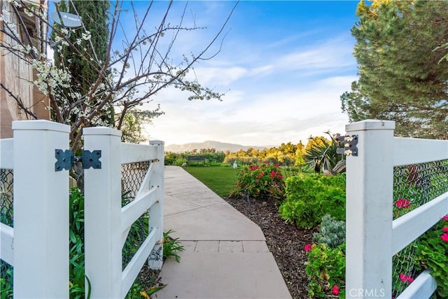 view of gate featuring a mountain view