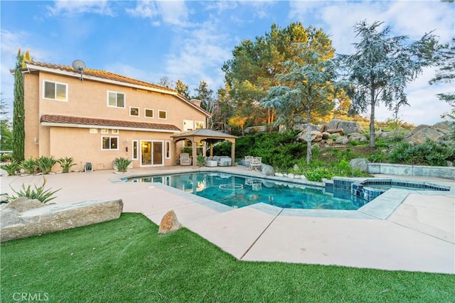 view of pool featuring a gazebo and a patio area