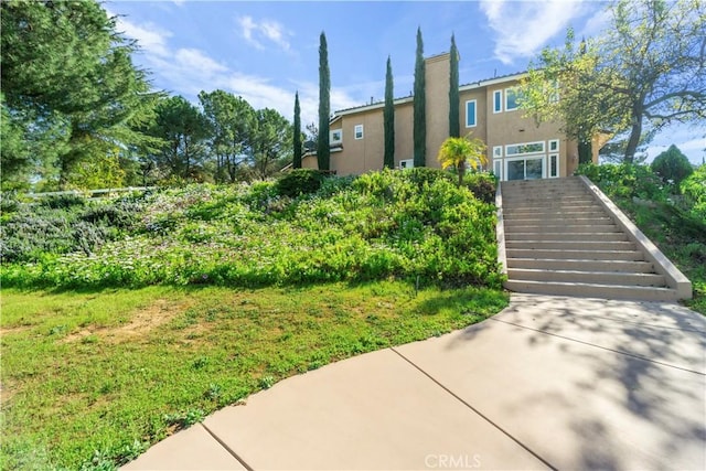 view of front of home with a front lawn