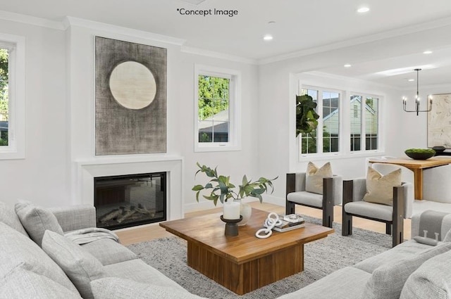 living room featuring light hardwood / wood-style floors, a notable chandelier, a healthy amount of sunlight, and ornamental molding