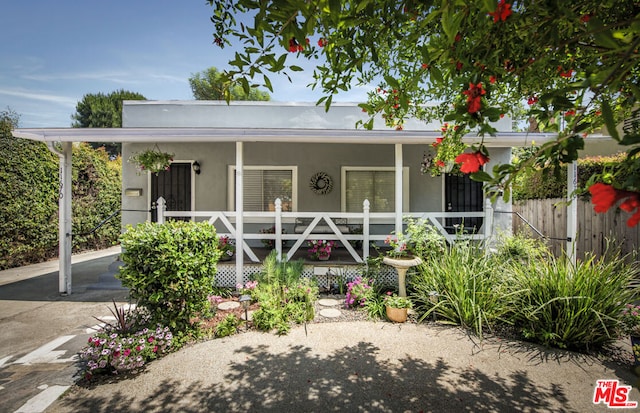 view of front of house featuring covered porch