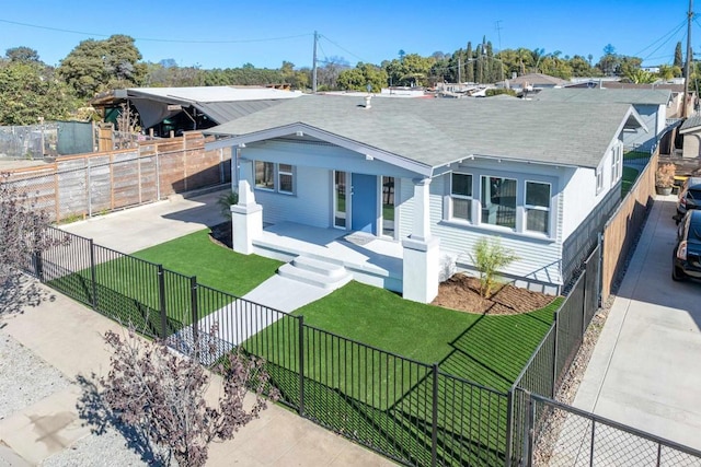 view of front of home with a front lawn