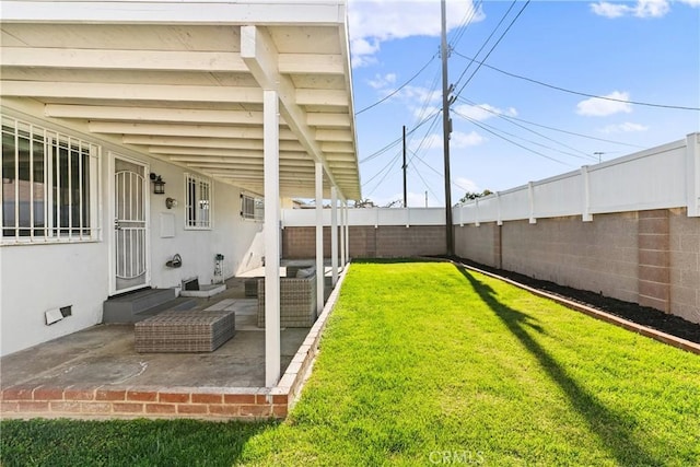 view of yard with a patio area