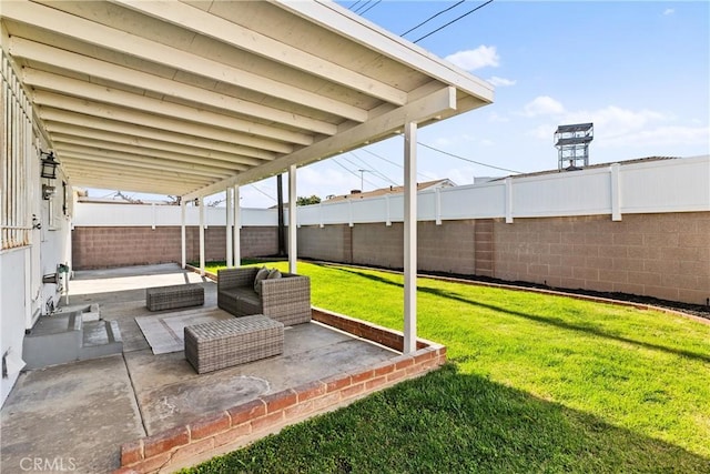 view of yard with an outdoor living space and a patio area