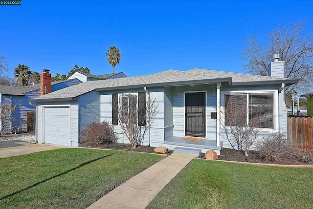 single story home with a front lawn and a garage