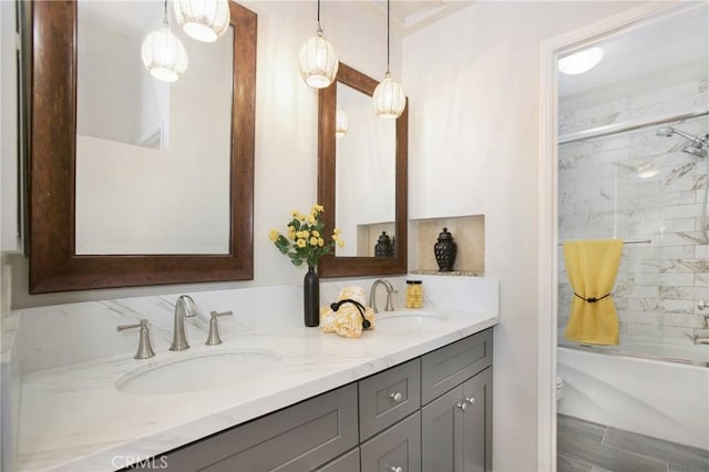 full bathroom featuring vanity, bath / shower combo with glass door, and toilet