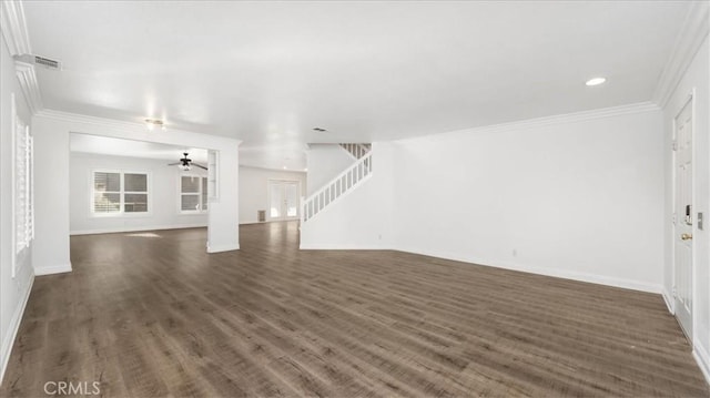 unfurnished living room with ceiling fan, dark hardwood / wood-style flooring, and ornamental molding