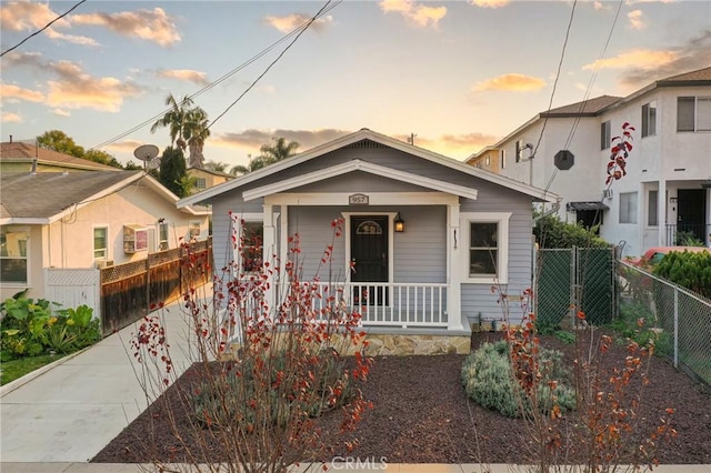 bungalow-style house featuring covered porch