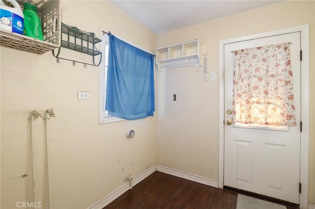 laundry area featuring dark hardwood / wood-style floors