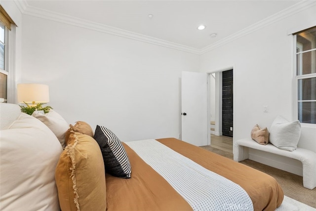 bedroom with carpet floors and ornamental molding