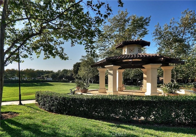 view of property's community featuring a gazebo and a yard