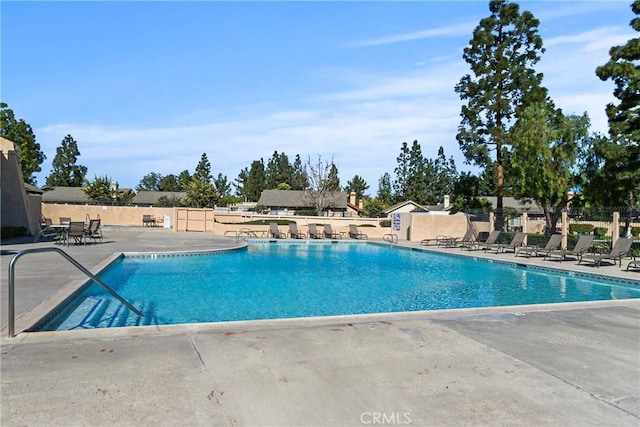 view of pool featuring a patio