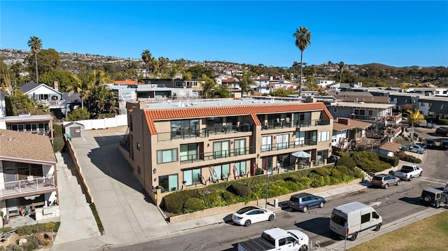 birds eye view of property with a residential view