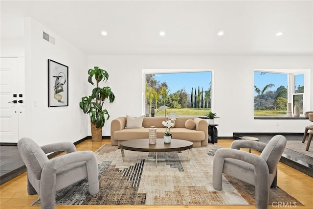 living room with light hardwood / wood-style floors