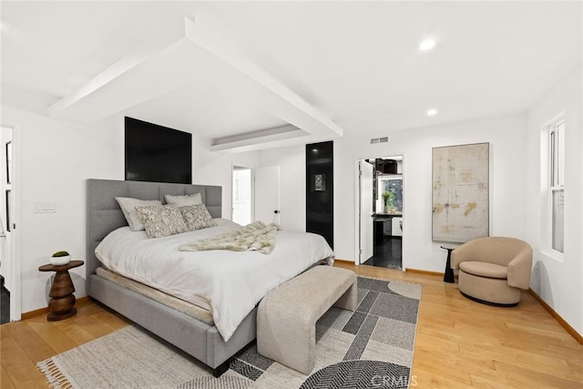 bedroom featuring light hardwood / wood-style floors