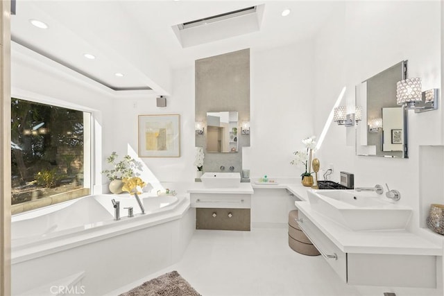 bathroom featuring vanity and a bathing tub