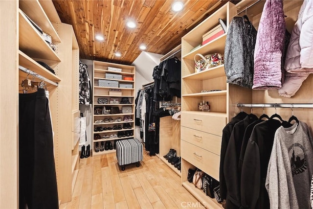 spacious closet featuring light hardwood / wood-style floors